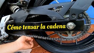 cómo tensionar ajustar la cadena de la moto [upl. by Myrle428]