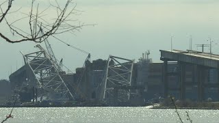 Images of collapsed Baltimore bridge as demolition crews work on it after ship collision  AFP [upl. by Onitnatsnoc]