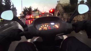 Pizza deliveries on a scooter in rainhail משלוחי פיצה כשיורד ברד [upl. by Alleras]