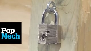 Padlock Gunshot Test  PopMech [upl. by Eniamirt]