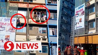 Quick action by firemen saves six backpackers on ledge in KK [upl. by Frech424]