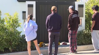 Matthew Perry fans pay their respects by leaving flowers in front of the late actors doorstep [upl. by Anomar]