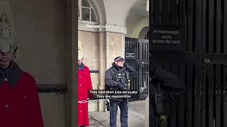 Armed police officer shuts down tourists heckling Kings Guard [upl. by Bartholomew184]