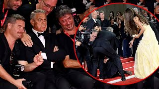 George Clooney rushes to help as photographer falls over at Wolfs premiere at Venice Film Festival [upl. by Siulesoj]