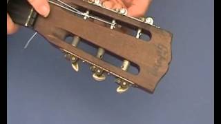 Changing strings on a Nylon String Guitar at the headstock  from guitarforbeginnerscom [upl. by Hume]