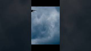 Wing vortices trailing the airplane as it pierces through the clouds vortex wings planes avgeek [upl. by Airdnekal764]