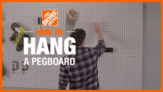 How to Hang a Pegboard  The Home Depot [upl. by Abey]