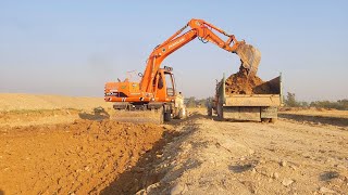 excavator operator cutting road silish area and loading tractor trolley  pakistani operater [upl. by Atik]