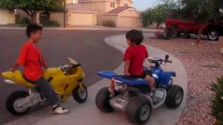 Motorcycle 4 year old on ATV 12 volts versus 7 year old on Motorcycle 36 volts [upl. by Collayer39]