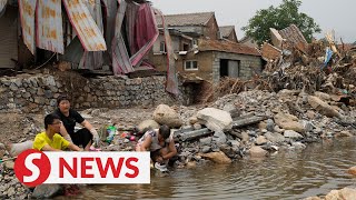 Beijing flood victims We ran for our lives [upl. by Sopher]