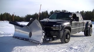 Snow Plowing Silverado 3500 with Snowdogg V Plow Pushing Snow [upl. by Sessylu75]