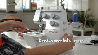 BERNINA overlocker L 220 inrijgen en coversteken naaien [upl. by Lleuqram]