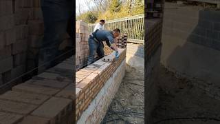 Skilled brick layer construction process of thick brick wall [upl. by Earal]