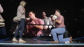 The Jonas Brothers Helped a Guy Propose to His Girlfriend Onstage at Their Raleigh Concert [upl. by Enairda]