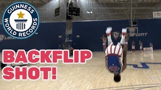 Harlem Globetrotters Farthest backflip basketball shot  Guinness World Records Day 2018 [upl. by Aniwde]