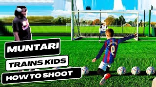 Sulley Muntari trains children how to shoot and score great goals [upl. by Dyoll]