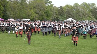 Massed Pipes and Drums march off ending the 2024 Banchory North of Scotland Pipe Band Championship [upl. by Kcinom402]