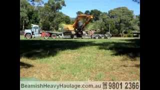 Side UnLoading Excavator from Folding Gooseneck Low Loader [upl. by Samara]