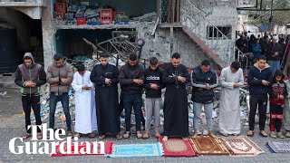 Palestinians visit cemeteries and pray outside destroyed mosques at Eid [upl. by Nitin]