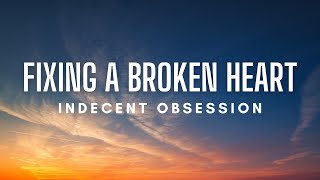 Indecent Obsession  Fixing A Broken Heart Lyrics [upl. by Sedgewinn]