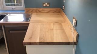 Solid oak worktop installation supplied by Worktops express [upl. by Dyan]