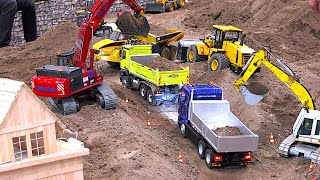 RC Construction Site lots of Trucks Excavators Dump Trucks Part 12 ModellHobbySpiel Leipzig 2023 [upl. by Nunci]