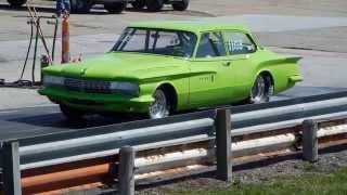 1961 Dodge Lancer at Mopars Invade MoKan Dragway on 452014 [upl. by Adnamaa791]