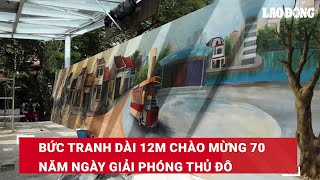 Bức tranh dài 12m chào mừng 70 năm ngày Giải phóng Thủ đô  Báo Lao Động [upl. by Erdnoid445]