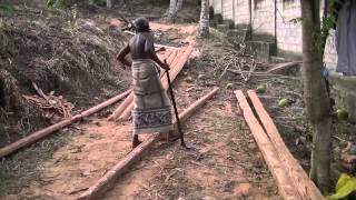 Adze Shaping Roofing Beams from Coconut Wood Premlanka Hotel Sri Lanka [upl. by Elisabetta]