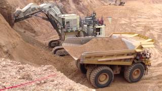 Liebherr 9400 and Cat 785c in West Africa [upl. by Drake437]