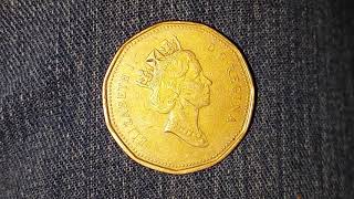 BEAUTIFUL 1990 DOLLAR COIN  CANADA [upl. by Nicol]