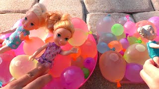 Water balloons Elsa amp Anna toddlers  pool  water fun  floaties [upl. by Sugar]