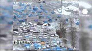 Horror quake hits Japan as tsunami smashes city [upl. by Berni615]