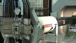 US Navy unveils highspeed rail gun [upl. by Htebaras]