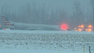 Plane out of Philadelphia International Airport slides off taxiway in Rochester New York [upl. by Lattimer]