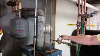 How To Remove Air From Your Heating System [upl. by Alesram174]