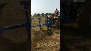 Farmtrac 6065 4x4 on 3 reversible Plough [upl. by Aninaj]