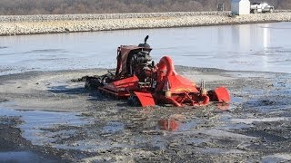 Nuhn Lagoon Crawler  Manure Agitation Boat Mixing a Lagoon [upl. by Sheffie558]