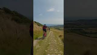 Descending off Nine Barrow Down on the Purbeck Dorset with Swanage in the distance mtb adventure [upl. by Philipa]