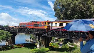 Ordinary Train 257 passes over the Kwae Yai Bridge better known as the Bridge over the River Kwai [upl. by Oiluj]