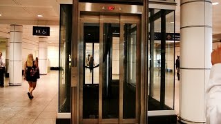 Epic Priceless amp Amazing inground hydraulic glass elevators  Montreal Trudeau Airport YUL [upl. by Zak]