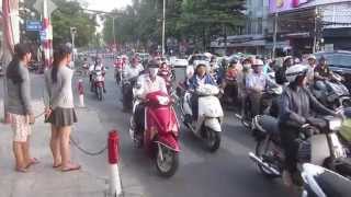 How to Cross a street in Saigon Vietnam [upl. by Erdnoid47]